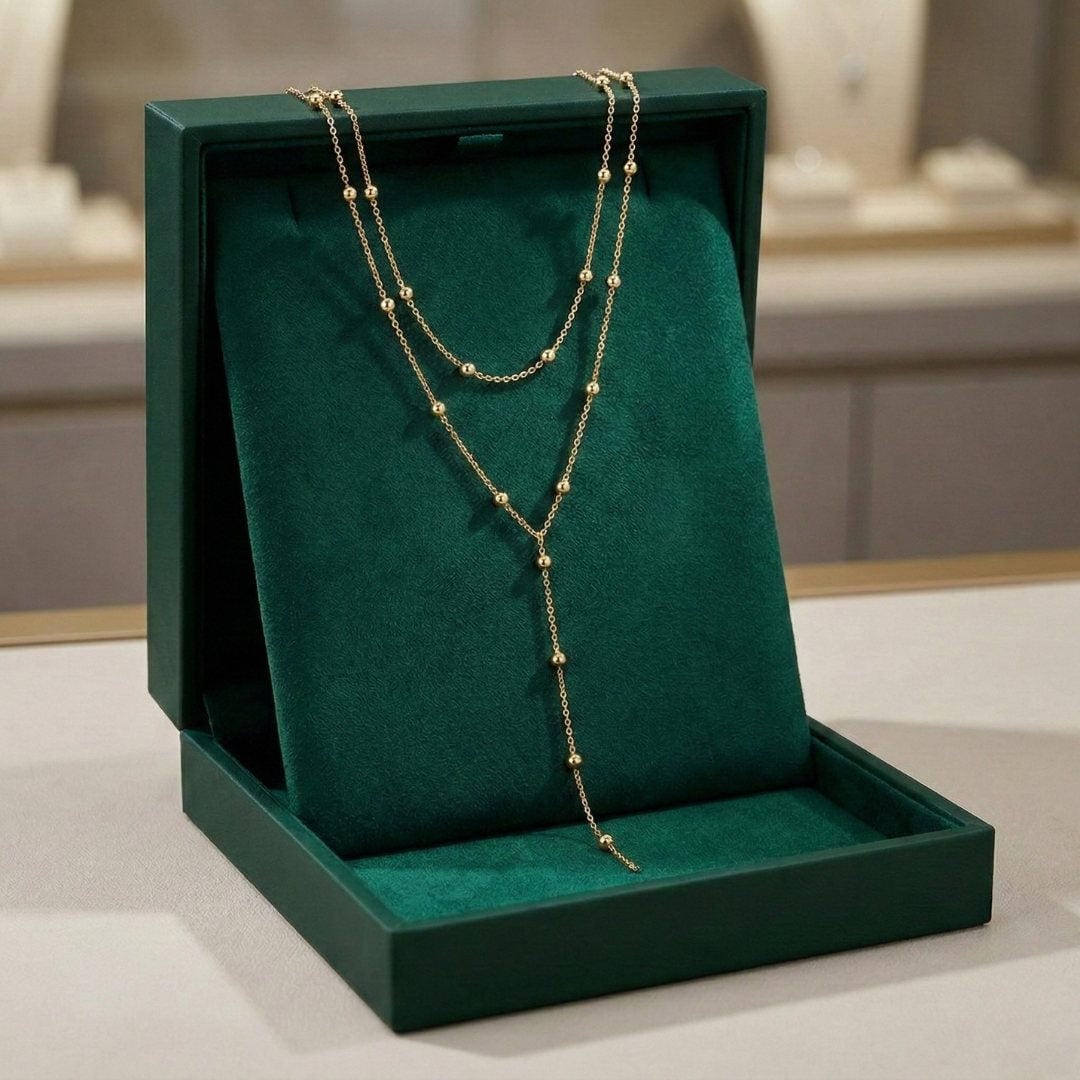 Gold Double-Layered Beaded Necklace with Long Tassels