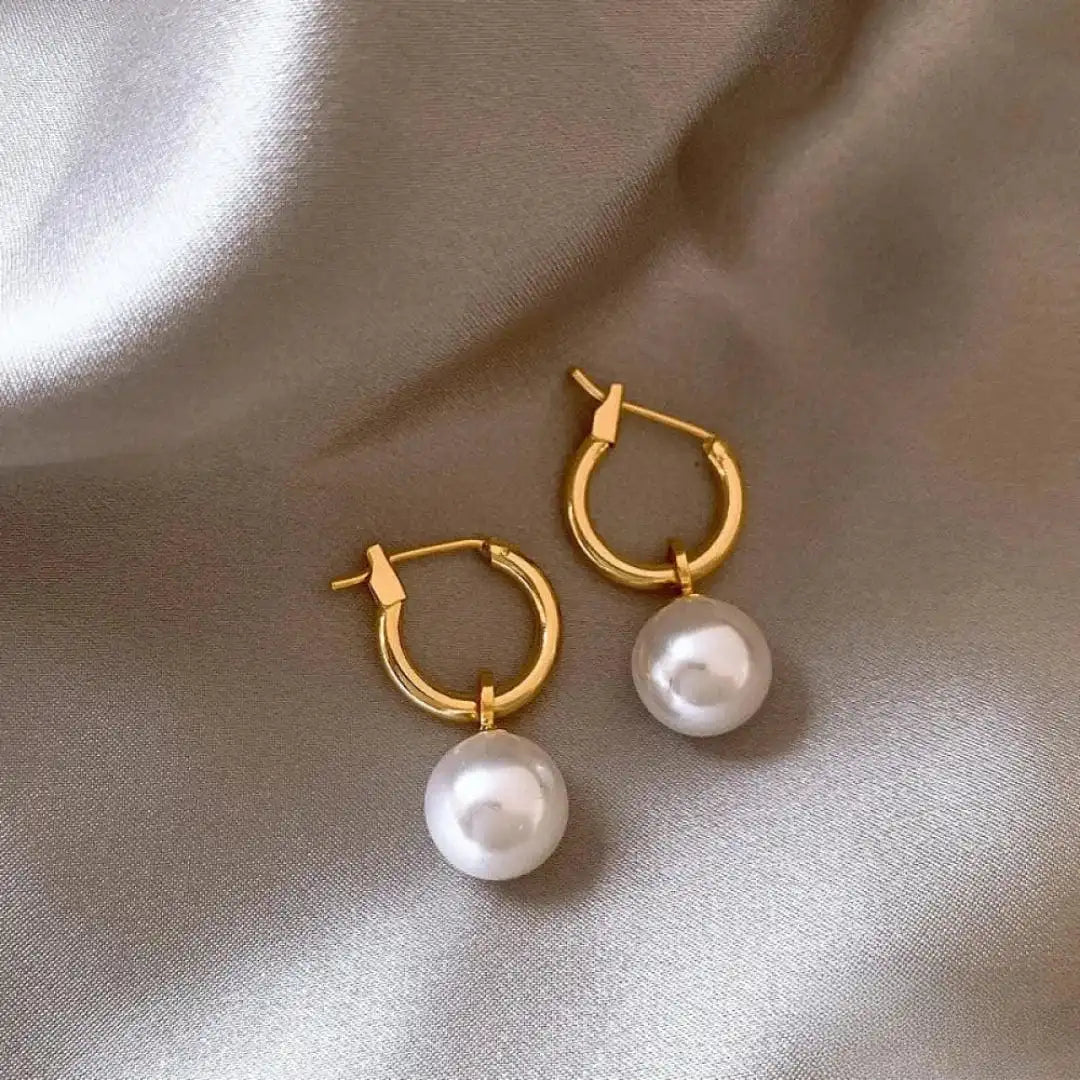Elegant Earrings Adorned with Gold and White Pearls