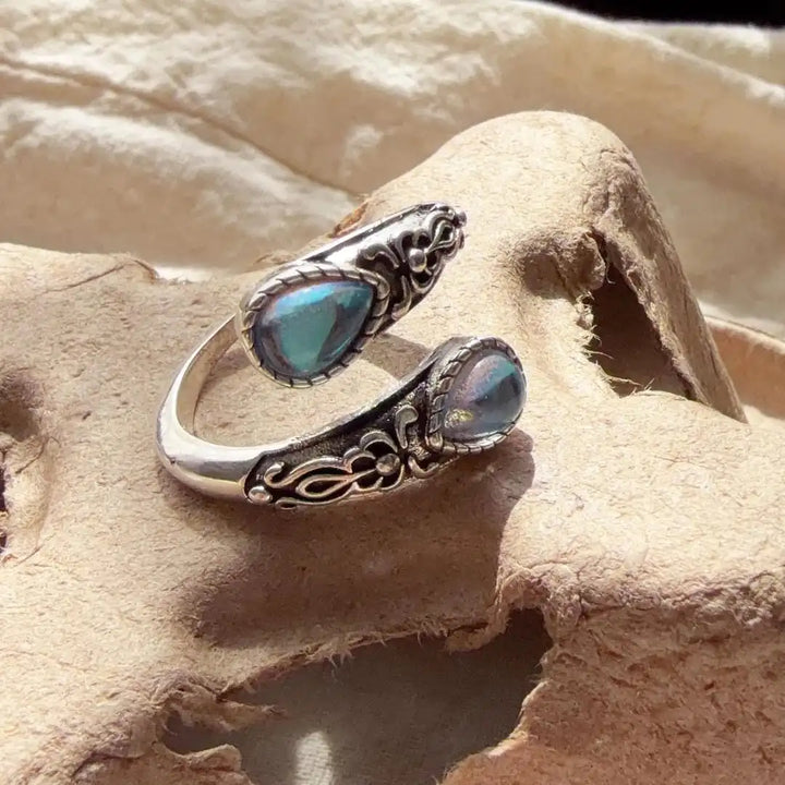 Vintage Adjustable Silver Ring Featuring Blue Stone