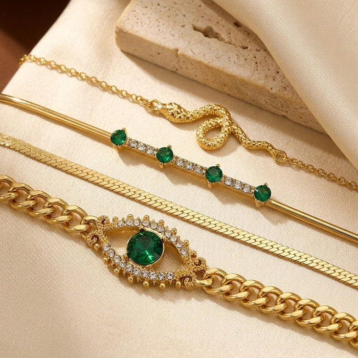 Emerald and Gold Charm Bracelet Collection