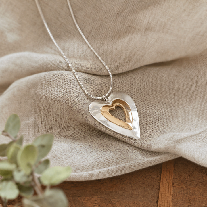 Lustrous Silver Gold Heart Necklace