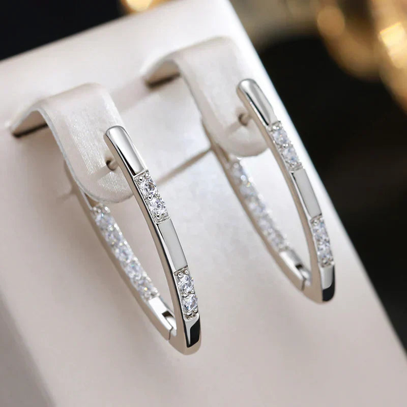 Elegant Gold Earrings Adorned with Zirconia Details